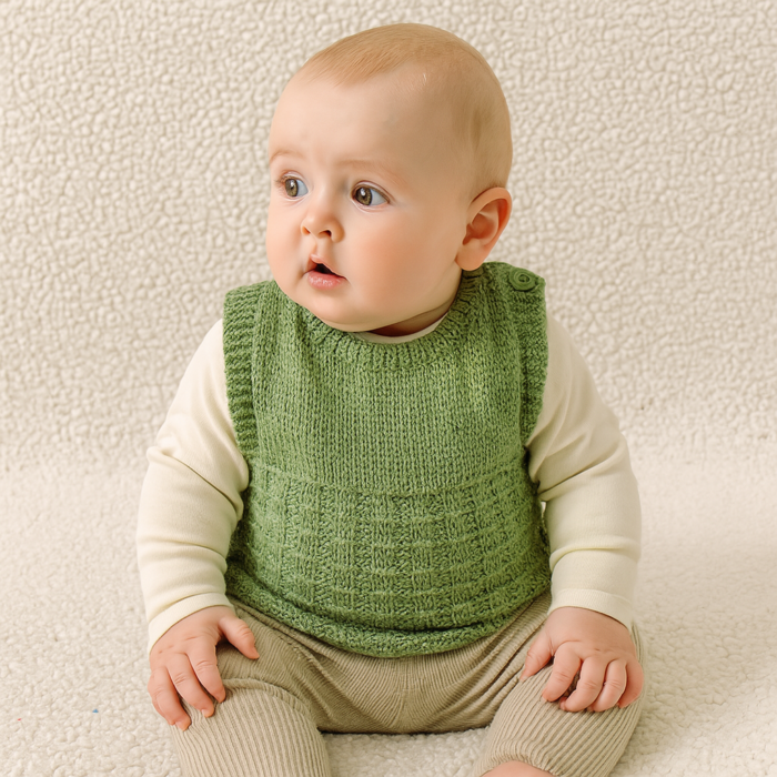 handknitted baby vest